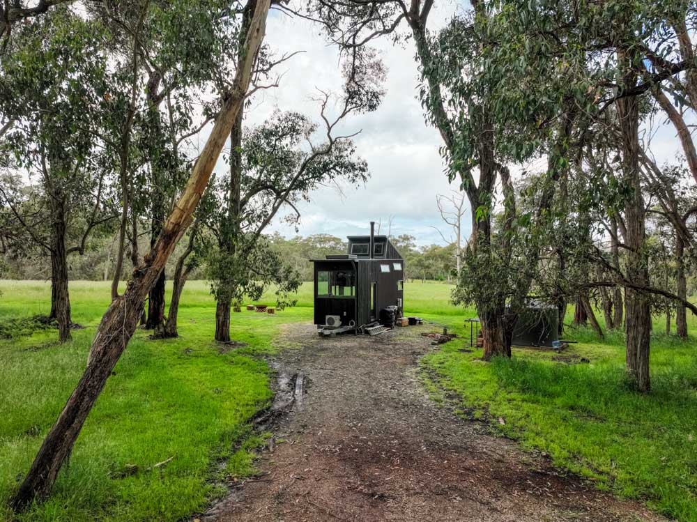 https://www.livingbiginatinyhouse.com/media/website_pages/episodes/ultra-tall-tiny-house-with-pop-top-roof-and-brilliant-home-office/TINY-HOUSE-7.jpg