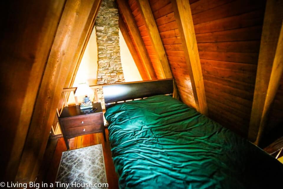One image of the bedroom area of the tiny home.