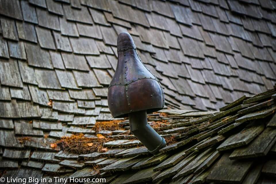 One photo of the metal mushroom shaped chimney top.