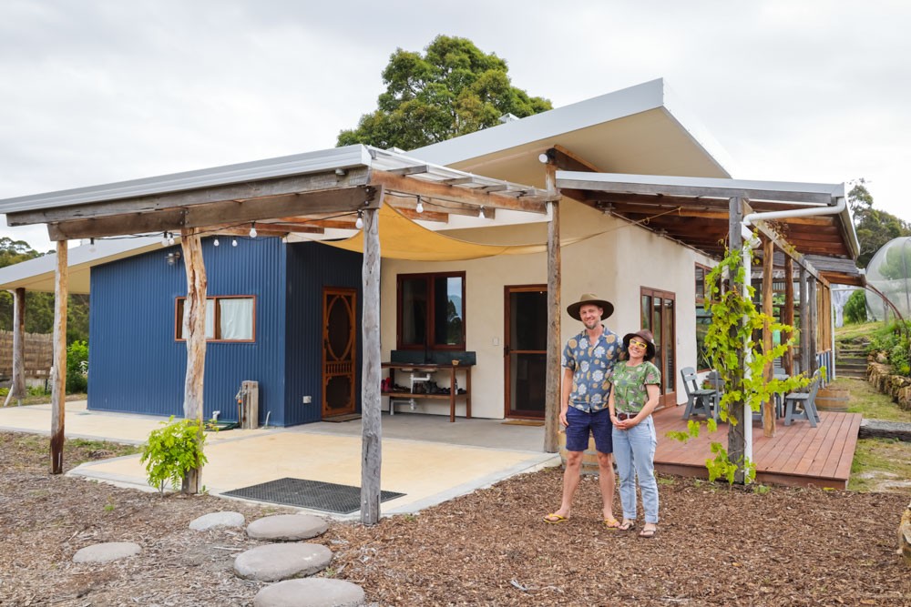 After 7 Years in Tiny Houses, They Built Their Dream Earth Home